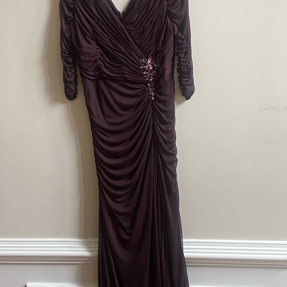 Deep Burgundy Evening Gown. Long sleeve plunging neckline. Scalloped and fitted.